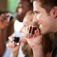 young people doing alcohol shots